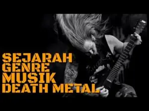Musisi death metal dengan rambut panjang bermain gitar di panggung konser.